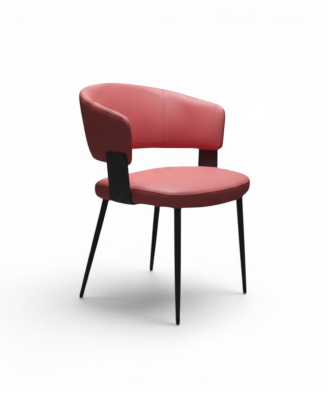Gharnish modern dining chair  with black metal legs and subtle stitching detail.